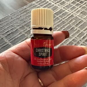 Young Living 100% Christmas Spirit Essential Oil. Opened 1/2 left in jar